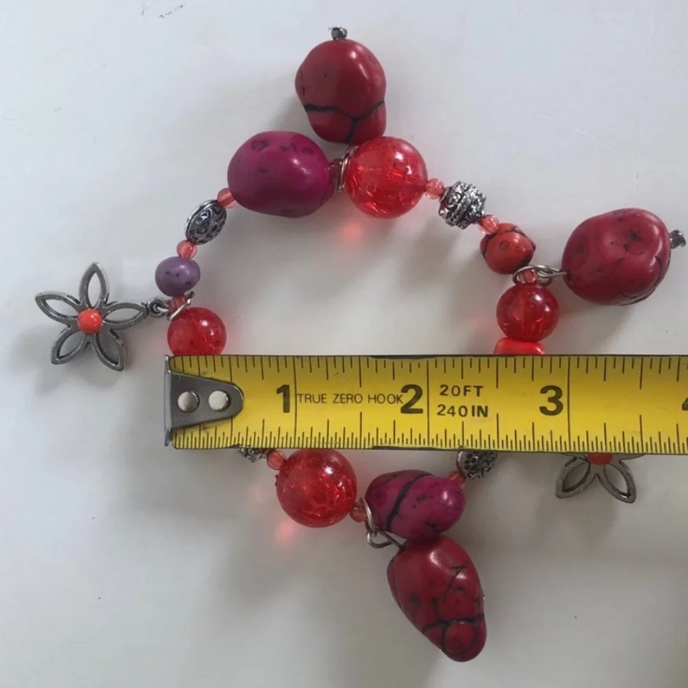 Handcrafted artisan red and burgundy stones paired with silver flowers bracelet